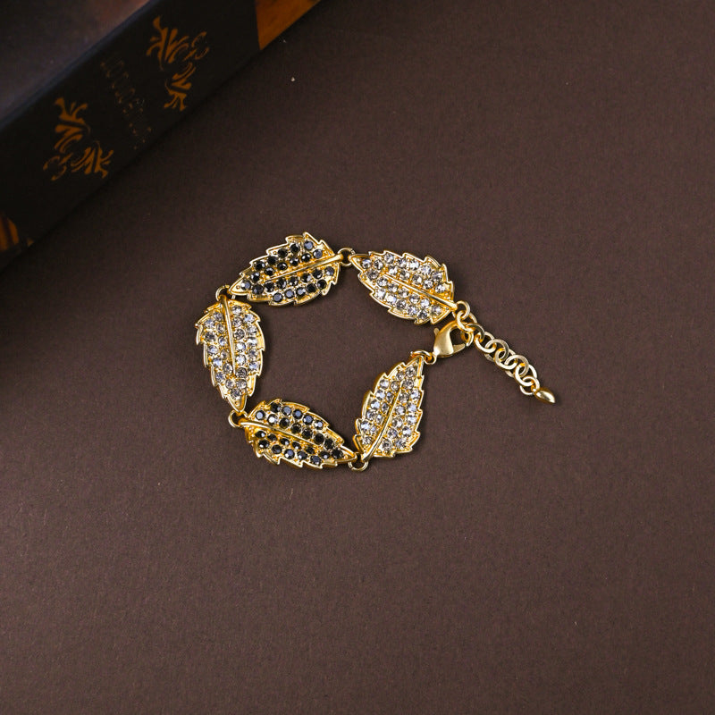 Vintage High-end Niche White and Gray Rhinestone Leaf Earrings, Bracelet, and Necklace Set for Women